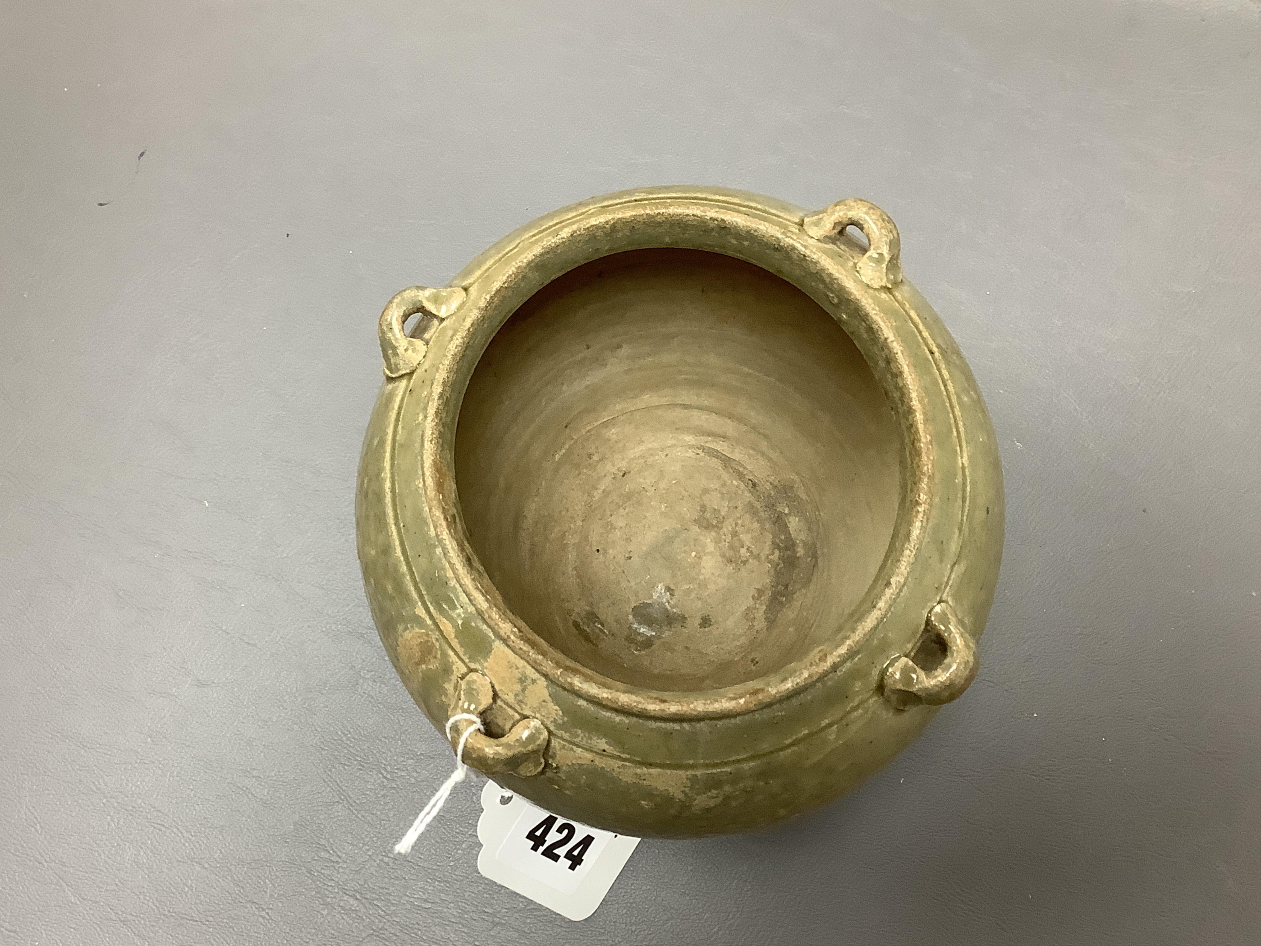 A Chinese olive green glazed jar, Tang Dynasty, 13cm